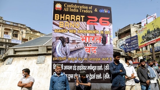 Traders participate in a Bharat Bandh protest called by the Confederation of All India Traders over various demands at Chawri Bazar, in New Delhi on Friday. (ANI Photo)