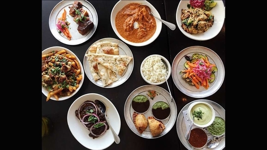 Badmaash, in Downtown Los Angeles, Hollywood, California: They serve everything from Goan pork curry, beef short ribs and butter chicken samosas, to more traditional onion bhajias, chicken tikka and cheese naans. But the star is their poutine - masala fries topped with cheese curds, doused in piping hot beef gravy, topped with tandoori chicken tikka & cilantro.(Courtest: Badmaash)