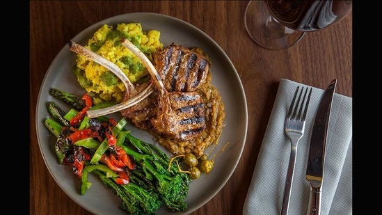 Besharam, in San Francisco, California: Light Indian food with a focus on Gujarati cooking. But Besharam’s menu also has unusual offerings such as kimchi samosas, kachori dhokli (described as English pea dumplings), lamb chops with cumin rice and broccolini, and fish moilee with coconut curry.(Courtesy: Besharam)