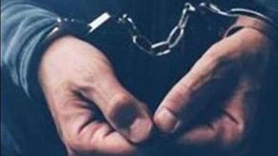 Arrested computer hacker and cyber criminal with handcuffs, close up of hands (Getty Images/iStockphoto) Arrested computer hacker and cyber criminal with handcuffs, close up of hands (Getty Images/iStockphoto)