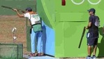 Mairaj Ahmad Khan (IND) of India competes as Luigi Lodde (ITA) of Italy watches. Khan failed to qualify for the skeet final. ((REUTERS)) Mairaj Ahmad Khan (IND) of India competes as Luigi Lodde (ITA) of Italy watches. Khan failed to qualify for the skeet final. ((REUTERS))
