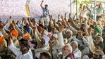 Farmers raise slogans during a protest against the new farm laws, at the Delhi-Ghazipur border in New Delhi on Thursday. (ANI Photo) Farmers raise slogans during a protest against the new farm laws, at the Delhi-Ghazipur border in New Delhi on Thursday. (ANI Photo)