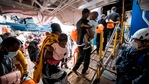 (FILES) In this file photo taken on September 02, 2020 rescued migrants are greeted by crew members of the Sea-Watch 4 rescue boat and Doctors without Borders (Medecins Sans Frontieres, MSF) as they leave the Sea-Watch 4 to board a ferry on which some 350 migrants will be under quarantine, off the coast of Palermo, Sicily, Italy. - The UN voiced alarm on January 28, 2021 at increasingly frequent pushbacks and expulsions of refugees at Europe's borders, warning that the very idea of asylum itself was under attack on the continent. (Photo by Thomas Lohnes / AFP)(AFP) (FILES) In this file photo taken on September 02, 2020 rescued migrants are greeted by crew members of the Sea-Watch 4 rescue boat and Doctors without Borders (Medecins Sans Frontieres, MSF) as they leave the Sea-Watch 4 to board a ferry on which some 350 migrants will be under quarantine, off the coast of Palermo, Sicily, Italy. - The UN voiced alarm on January 28, 2021 at increasingly frequent pushbacks and expulsions of refugees at Europe's borders, warning that the very idea of asylum itself was under attack on the continent. (Photo by Thomas Lohnes / AFP)(AFP)