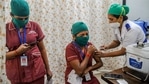 A medic administers the first dose of Covid-19 vaccine to a frontline worker in Mumbai.(PTI Photo ) A medic administers the first dose of Covid-19 vaccine to a frontline worker in Mumbai.(PTI Photo )