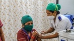 A medic administers the first dose of Covid-19 vaccine to a frontline worker during a Covid-19 inoculation drive.(PTI) A medic administers the first dose of Covid-19 vaccine to a frontline worker during a Covid-19 inoculation drive.(PTI)