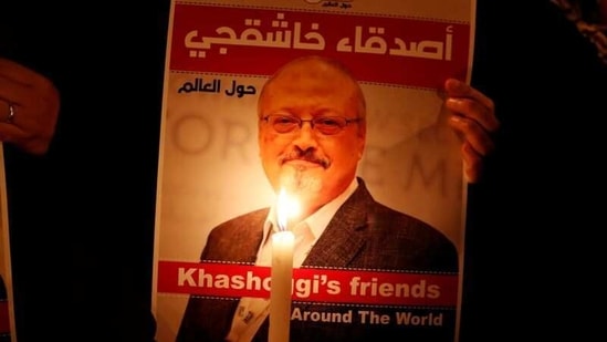 A demonstrator holds a poster with a picture of Saudi journalist Jamal Khashoggi outside the Saudi Arabia consulate in Istanbul, in 2018.(Reuters File Photo)