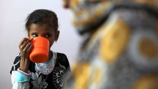 Ahmadiya Juaidi, 13, drinks a supplemental nutrition shake at malnutrition treatment ward of al-Sabeen hospital in Sanaa, Yemen February 24, 2021. (REUTERS)