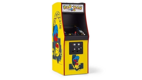 The chip-powered arcade game, Pac-Man, sparked a worldwide craze, bringing microprocessors into the mainstream. Through the 1980s, microprocessors began to power everyday devices – washing machines, Casio Databank watches, the Gameboy, VHS and Betamax tape players, multi-function TV remote controls and automatic safety features in cars.(Atari)