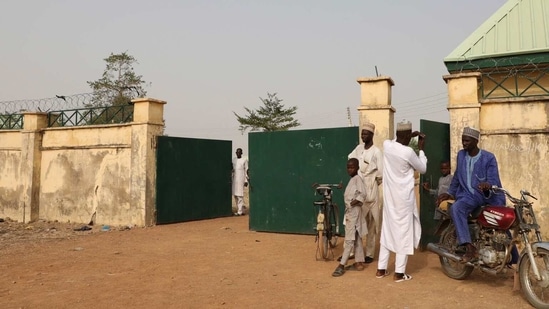 Parents of kidnapped students of Government Girls Junior Secondary School wait for information about family members following an attack by gunmen in Jangebe, Nigeria.(AP) Parents of kidnapped students of Government Girls Junior Secondary School wait for information about family members following an attack by gunmen in Jangebe, Nigeria.(AP)