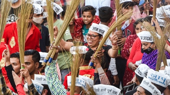 AAP supporters during party convenor and Delhi CM Arvind Kejriwal's roadshow for MCD by-elections in Shalimar Bagh village, New Delhi,(PTI) AAP supporters during party convenor and Delhi CM Arvind Kejriwal's roadshow for MCD by-elections in Shalimar Bagh village, New Delhi,(PTI)