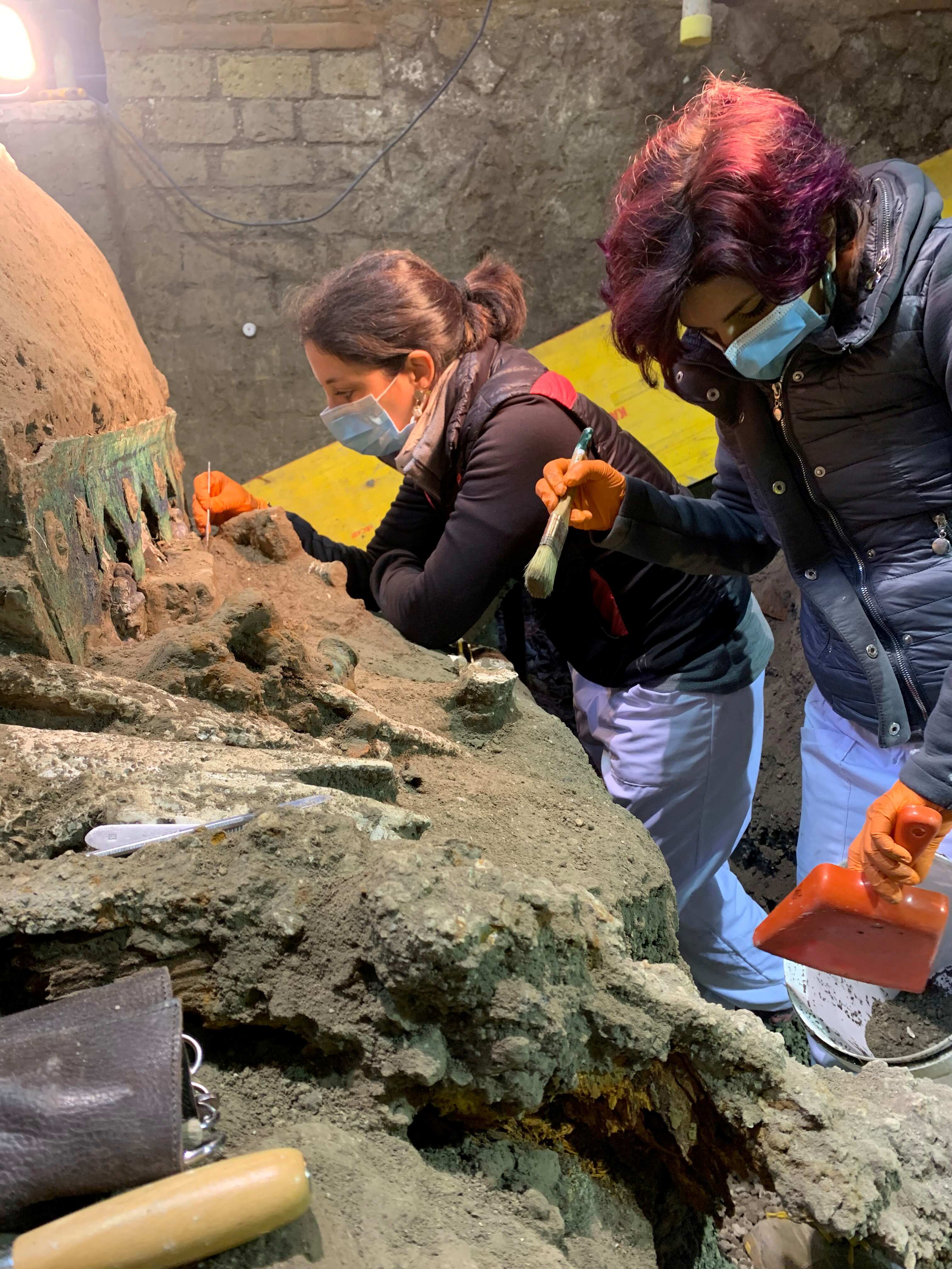 Archeologists uncover an ancient ceremonial carriage in a dig near the ancient Roman city of Pompeii, destroyed in 79 AD in volcanic eruption, Italy, February, 2021. Pompeii Archeological Park. (via REUTERS)
