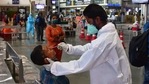 A health worker wearing protective gear takes a nasal swab sample of inbound travellers for Covid-19 coronavirus tests at CSMT railway station, in Mumbai.(Bhushan Koyande / HT file photo) A health worker wearing protective gear takes a nasal swab sample of inbound travellers for Covid-19 coronavirus tests at CSMT railway station, in Mumbai.(Bhushan Koyande / HT file photo)
