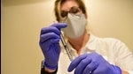 A Johnson & Johnson worker prepares a syringe during the Phase 3 trial of its coronavirus vaccine candidate in an undated photograph. (REUTERS FILE) A Johnson & Johnson worker prepares a syringe during the Phase 3 trial of its coronavirus vaccine candidate in an undated photograph. (REUTERS FILE)