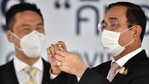 Thailand's Prime Minister Prayut Chan-O-Cha (R) looks at a vial of the Coronavac Covid-19 coronavirus vaccine, developed by China's Sinovac firm, beside Yang Xin, Chargé d'Affaires of the Chinese embassy. (AFP) Thailand's Prime Minister Prayut Chan-O-Cha (R) looks at a vial of the Coronavac Covid-19 coronavirus vaccine, developed by China's Sinovac firm, beside Yang Xin, Chargé d'Affaires of the Chinese embassy. (AFP)