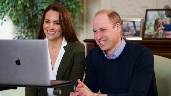 In this undated handout photo provided by Kensington Palace on Saturday, Feb. 27, 2021, Britain's Prince William and Kate, Duchess of Cambridge smile during a video call to people with health conditions about the positive impact of the COVID-19 vaccine. The Duke of Cambridge has urged people to keep on taking the Covid-19 vaccination so "younger generations" will feel "it's really important for them to have it". (Kensington Palace via AP)(AP)