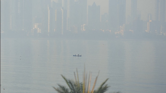 A fisherman in his boat in hazy weather off Bandra coast in Mumbai on Sunday. (Satish Bate/HT Photo) A fisherman in his boat in hazy weather off Bandra coast in Mumbai on Sunday. (Satish Bate/HT Photo)