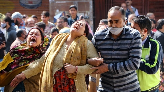 Mother of 22-year-old Aakash Mehra, who was shot and injured by militants on February 17 in Srinagar, wails during his funeral at Janipur Colony in Jammu. (PTI) Mother of 22-year-old Aakash Mehra, who was shot and injured by militants on February 17 in Srinagar, wails during his funeral at Janipur Colony in Jammu. (PTI)