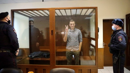 Opposition leader Alexei Navalny stands in a cage in the Babuskinsky District Court in Moscow, Russia, Saturday, Feb. 20, 2021.(AP) Opposition leader Alexei Navalny stands in a cage in the Babuskinsky District Court in Moscow, Russia, Saturday, Feb. 20, 2021.(AP)