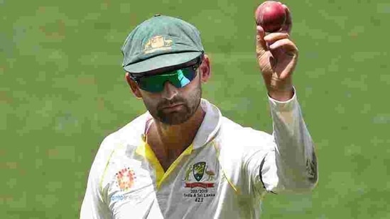 Australia's Nathan Lyon shows the ball as he leaves the field following his 6 wicket haul on day four of the first test match between Australia and India at the Adelaide Oval in Adelaide, Australia, December 9, 2018.(REUTERS) Australia's Nathan Lyon shows the ball as he leaves the field following his 6 wicket haul on day four of the first test match between Australia and India at the Adelaide Oval in Adelaide, Australia, December 9, 2018.(REUTERS)