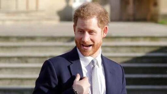 Britain's Prince Harry gestures in the gardens of Buckingham Palace in London. (AP) Britain's Prince Harry gestures in the gardens of Buckingham Palace in London. (AP)