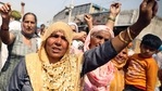 Women farmers raise slogans during a protest against the new farm laws, at the Singhu border in New Delhi(ANI) Women farmers raise slogans during a protest against the new farm laws, at the Singhu border in New Delhi(ANI)