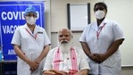 PM Modi with healthcare workers after receiving Covid-19 vaccine at AIIMS, New Delhi. (PMO) PM Modi with healthcare workers after receiving Covid-19 vaccine at AIIMS, New Delhi. (PMO)