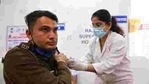A health worker administers Covid-19 vaccine to a Delhi Police personnel at a hospital in New Delhi.(AP) A health worker administers Covid-19 vaccine to a Delhi Police personnel at a hospital in New Delhi.(AP)