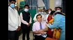 Former medical superintendent of PGIMS, Rohtak, Dr Ashok Chauhan, getting a jab of the anti-Covid vaccine. (Manoj Dhaka/HT) Former medical superintendent of PGIMS, Rohtak, Dr Ashok Chauhan, getting a jab of the anti-Covid vaccine. (Manoj Dhaka/HT)