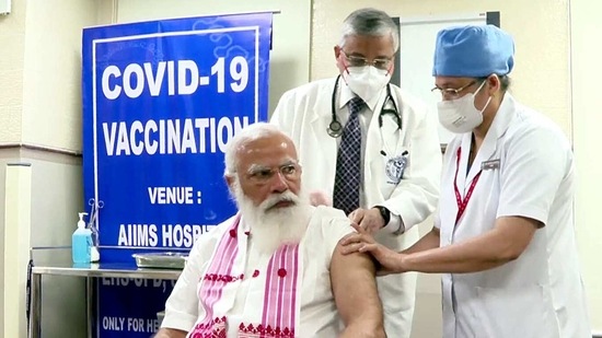 Prime Minister Narendra Modi gets his first dose of Covid-19 vaccine, at AIIMS in New Delhi. (ANI Photo)