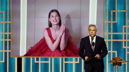 Rosamund Pike accepts the Best Actress in a Motion Picture - Musical/Comedy award for "I Care a Lot," via video, from Ben Stiller, who was presenting the award from New York,(Peter Kramer/NBC via REUTERS)