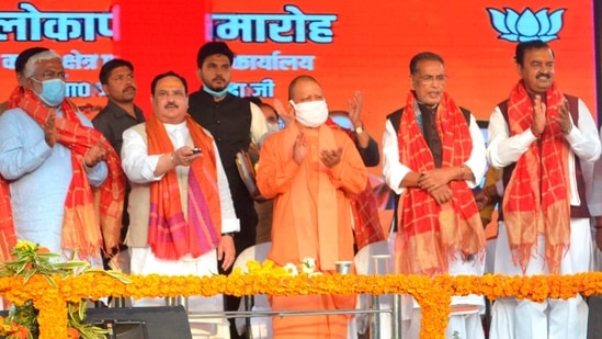 Varanasi: BJP National Presdent J P Nadda inaugurates the Kashi BJP office building as UP CM Yogi Adityanath claps, in Varanasi, Sunday, Feb. 28, 2021. (PTI Photo) (PTI02_28_2021_000211B)(PTI)