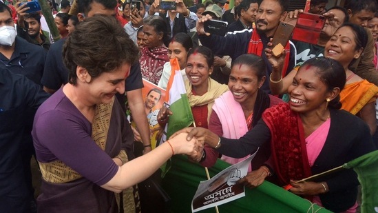 All India Congress Committee (AICC) General Secretary Priyanka Gandhi Vadra is welcomed by party supporters during her visit to Assam, ahead of state assembly polls, in Lakhimpur district.(PTI)