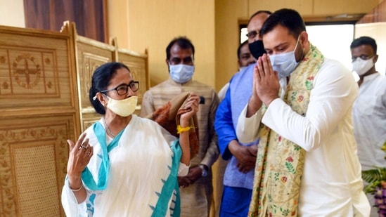 West Bengal Chief Minister Mamata Banerjee with RJD leader Tejaswi Yadav at State Secretariat, in Kolkata on Monday.(PTI)