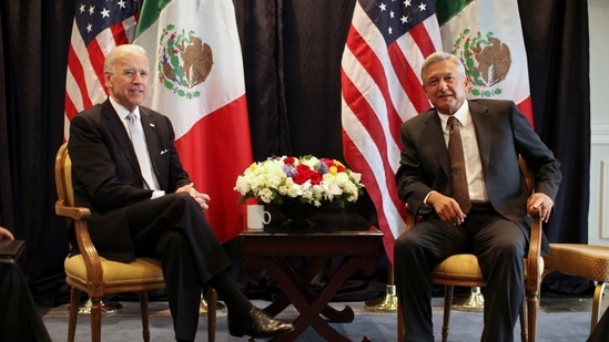 Then-US Vice President Joe Biden, left, poses for photos with then-Mexican presidential candidate Andres Manuel Lopez Obrador in Mexico City,(AP/ File photo)