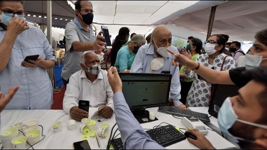 Senior citizens register to get their first dose of Covid-19 vaccine at BKC jumbo Covid centre in Mumbai on Monday. (Satish Bate/HT Photo) Senior citizens register to get their first dose of Covid-19 vaccine at BKC jumbo Covid centre in Mumbai on Monday. (Satish Bate/HT Photo)