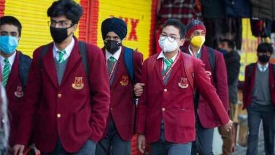Students wearing masks arrive to attend a school in Srinagar, on Monday, March.1, 2021. Schools reopened on Monday for classes 8 to 12 in Kashmir, eleven months after being closed due to the coronavirus pandemic. (AP) Students wearing masks arrive to attend a school in Srinagar, on Monday, March.1, 2021. Schools reopened on Monday for classes 8 to 12 in Kashmir, eleven months after being closed due to the coronavirus pandemic. (AP)
