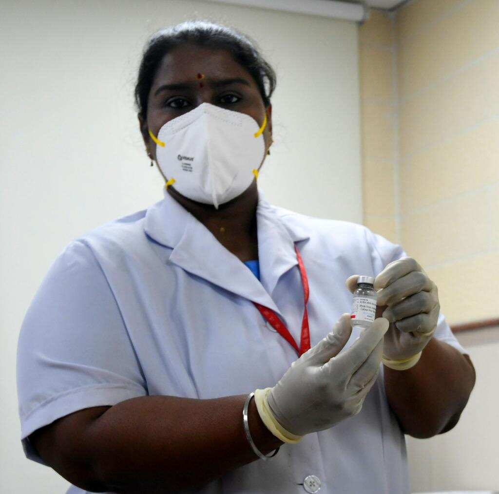 Health worker P Niveda, who hails from Puducherry, administered the first dose of the vaccine to Prime Minister Narendra Modi. Health worker P Niveda, who hails from Puducherry, administered the first dose of the vaccine to Prime Minister Narendra Modi.