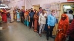 Voters stand in a queue to cast their vote at a polling centre in the first phase of Gujarat civic body elections.(PTI) Voters stand in a queue to cast their vote at a polling centre in the first phase of Gujarat civic body elections.(PTI)