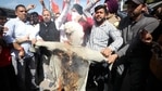 Congress members burn an effigy of senior party leader Ghulam Nabi Azad during a protest, in Jammu on Tuesday.(PTI) Congress members burn an effigy of senior party leader Ghulam Nabi Azad during a protest, in Jammu on Tuesday.(PTI)