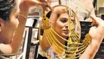 A woman looks at a gold necklace in a shop in Noida in this file photo.(Virendra Singh Gosain/ HT Photo) A woman looks at a gold necklace in a shop in Noida in this file photo.(Virendra Singh Gosain/ HT Photo)