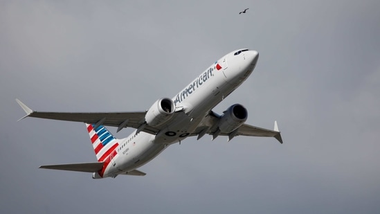 American Airlines flight 718, the first US Boeing 737 MAX commercial flight since regulators lifted a 20-month grounding in November, takes off from Miami, Florida, US. (Reuters)