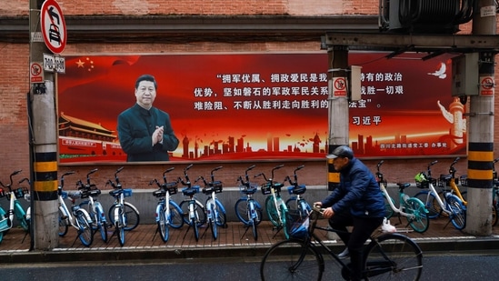 Pictures of Chinese President Xi Jinping overlook a street ahead of the National People's Congress (NPC), in Shanghai, China.(Reuters)