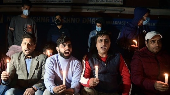 Civil society members and corporators from Srinagar during a candle light protest outside Krishna Dhaba, whose owner's son Aakash Mehra succumbed to injuries, 11 days after he was shot.(ANI) Civil society members and corporators from Srinagar during a candle light protest outside Krishna Dhaba, whose owner's son Aakash Mehra succumbed to injuries, 11 days after he was shot.(ANI)
