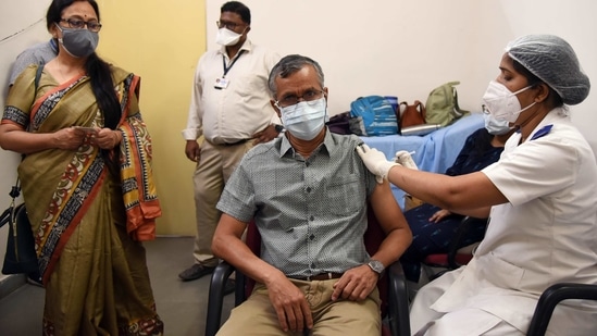 An elderly person gets vaccinated against Covid-19 at NMMC Hospital in Vashi, Navi Mumbai on March 1. India has reported the highest number of Covid-19 cases after the United States and has so far delivered 14 million doses, mostly to health and front-line workers since starting its immunisation programme in mid-January, HT reported(Bachchan Kumar / HT Photo)