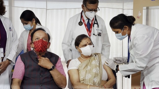 A medic administers the first dose of COVID-19 vaccine to Nutan Goel, wife of Union Health Minister Dr Harsh Vardhan during the second phase of a countrywide inoculation drive, at Delhi Heart and Lung Institute in New Delhi, (PTI) A medic administers the first dose of COVID-19 vaccine to Nutan Goel, wife of Union Health Minister Dr Harsh Vardhan during the second phase of a countrywide inoculation drive, at Delhi Heart and Lung Institute in New Delhi, (PTI)