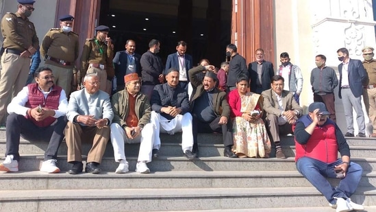 Opposition MLAs at a sit-in at the legislative assembly in Gairsain on Tuesday over Monday's lathi charge against villagers.(Kalyan Das/HT PHOTO) Opposition MLAs at a sit-in at the legislative assembly in Gairsain on Tuesday over Monday's lathi charge against villagers.(Kalyan Das/HT PHOTO)