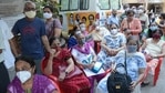 People wait during a Covid-19 vaccination drive at Kopri, in Thane on March 2. India on March 3 registered a spike in daily infections from the previous days' 12,286 cases reporting 14,989 new cases a day later, HT reported.