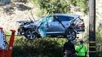 FILE - A crane is used to lift a vehicle following a rollover accident involving golfer Tiger Woods(AP) FILE - A crane is used to lift a vehicle following a rollover accident involving golfer Tiger Woods(AP)