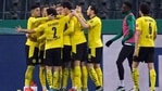 Soccer Football - DFB Cup - Quarter Final - Borussia Moenchengladbach v Borussia Dortmund - Borussia-Park, Moenchengladbach, Germany - March 2, 2021 Borussia Dortmund's Jadon Sancho celebrates scoring their first goal with teammates Pool via REUTERS/Ina Fassbender(Pool via REUTERS)