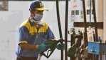 A petrol pump employee wearing a face mask while attending to a customer in Trinagar, New Delhi.(Sanchit Khanna/HT File Photo) A petrol pump employee wearing a face mask while attending to a customer in Trinagar, New Delhi.(Sanchit Khanna/HT File Photo)